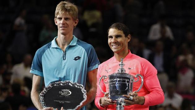 Rafael Nadal poses for photos with Kevin Anderson after winning the men's singles final of the U.S. Open on Sunday. (AP) Rafael Nadal poses for photos with Kevin Anderson after winning the men's singles final of the U.S. Open on Sunday. (AP)
