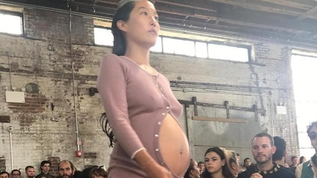 Maia Ruth Lee walked the ramp with an eight-month-pregnant baby bump for the Eckhaus Latta Spring 2018 collection.(nicolephelps Instagram)