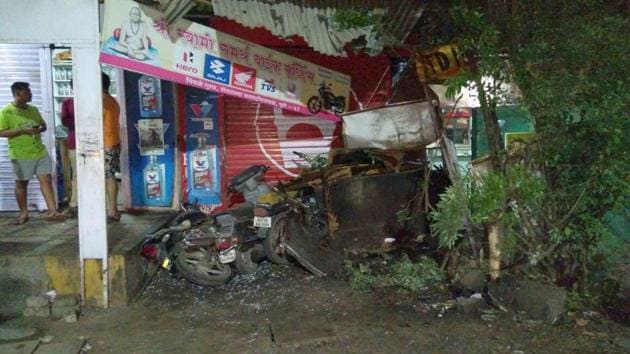 In the accident, the bus and the garage were heavily damaged.(HT PHOTO)