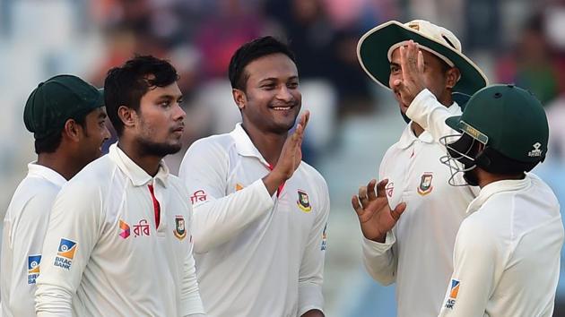 Bangladeshi spinner Shakib Al Hasan (C) celebrates with teammates after the dismissal of Australian batsman Ashton Agar during the third day of the second cricket Test between Bangladesh and Australia at Zahur Ahmed Chowdhury Stadium in Chittagong on September 6, 2017. (AFP) Bangladeshi spinner Shakib Al Hasan (C) celebrates with teammates after the dismissal of Australian batsman Ashton Agar during the third day of the second cricket Test between Bangladesh and Australia at Zahur Ahmed Chowdhury Stadium in Chittagong on September 6, 2017. (AFP)