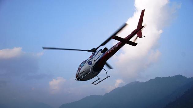 A file photograph of a helicopter flying over the Kedarnath valley in Uttarakhand. (HT PHOTO) A file photograph of a helicopter flying over the Kedarnath valley in Uttarakhand. (HT PHOTO)
