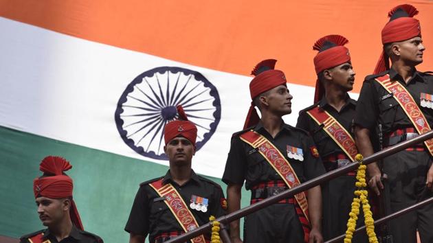 Army personnel posing with Indian National Flag during Independence Day celebration at the Red Fort in New Delhi. (Raj K Raj/HT Representative purpose) Army personnel posing with Indian National Flag during Independence Day celebration at the Red Fort in New Delhi. (Raj K Raj/HT Representative purpose)