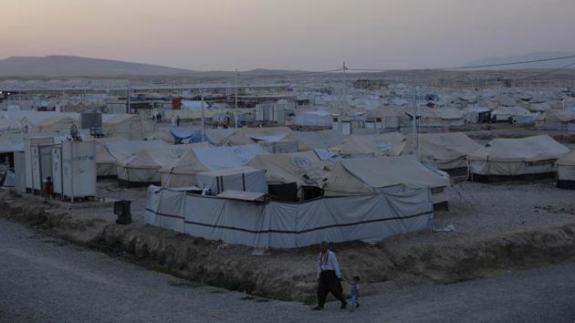 ‘One’s village is like his mother. You can never abandon her,’ said Ahmed Hassan Khalaf, another native of Hassan Sham and a father of 13 who is in his mid-70s and in poor health. ‘We used to grow tomatoes on the land on which this camp is built,’ he said, grabbing a fist full of pebbles from the ground outside his tent. Then he murmured, barely audible in despair, ‘Oh God, oh God the compassionate.’ (Bram Janssen / AP) ‘One’s village is like his mother. You can never abandon her,’ said Ahmed Hassan Khalaf, another native of Hassan Sham and a father of 13 who is in his mid-70s and in poor health. ‘We used to grow tomatoes on the land on which this camp is built,’ he said, grabbing a fist full of pebbles from the ground outside his tent. Then he murmured, barely audible in despair, ‘Oh God, oh God the compassionate.’ (Bram Janssen / AP)