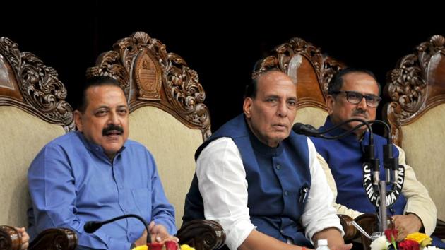 Union Home Minister Rajnath Singh flanked by MoS in PMO Jatinder singh and Jammu and Kashmir Deputy CM Nirmal Singh addressing a press conference, in Jammu, on Tuesday.(HT PHOTO)