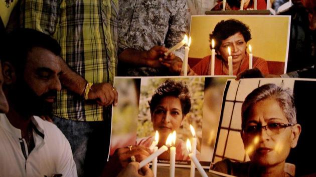 People hold a demonstration to protest the killing of Gauri Lankesh, a senior Kannada journalist, in Amritsar on September 8. (PTI photo) People hold a demonstration to protest the killing of Gauri Lankesh, a senior Kannada journalist, in Amritsar on September 8. (PTI photo)