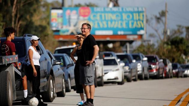Local residents wait for the reopening of the entry road for the Florida Keys road after Hurricane Irma strikes Florida, in Homestead, Florida, US, on Monday. (Reuters Photo) Local residents wait for the reopening of the entry road for the Florida Keys road after Hurricane Irma strikes Florida, in Homestead, Florida, US, on Monday. (Reuters Photo)