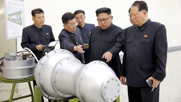 An undated file photo distributed on Sept. 3, 2017, by the North Korean government, shows leader Kim Jong Un (2nd R), at an undisclosed location in North Korea. The ministry lambasted the latest resolution, calling it a ‘heinous provocation aimed at depriving the DPRK of its legitimate right for self-defence and completely suffocating its state and people through full-scale economic blockade’. (AP) An undated file photo distributed on Sept. 3, 2017, by the North Korean government, shows leader Kim Jong Un (2nd R), at an undisclosed location in North Korea. The ministry lambasted the latest resolution, calling it a ‘heinous provocation aimed at depriving the DPRK of its legitimate right for self-defence and completely suffocating its state and people through full-scale economic blockade’. (AP)