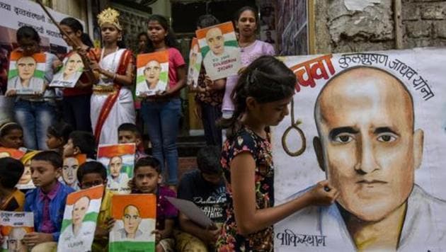 A painting of Kulbhushan Yadav by Gurukul students is held up at a protest against his death sentence in Mumbai, in April 2017. (Kunal Patil/HT File Photo) A painting of Kulbhushan Yadav by Gurukul students is held up at a protest against his death sentence in Mumbai, in April 2017. (Kunal Patil/HT File Photo)