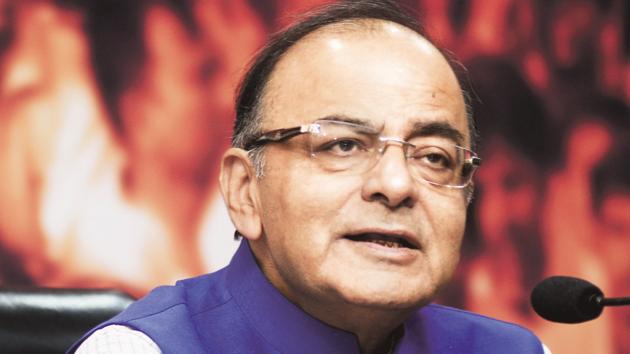 Finance minister Arun Jaitley said biometric identification number Aadhaar was an evolving idea under the previous UPA regime and it did not have legislative backing. (HT File Photo)