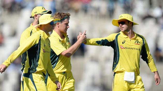 Australian cricketer Adam Zampa (C) celebrates with teammates a wicket of Mayank Agarwal during the Australia XI and Indian Board President XI warm up cricket match in Chennai on September 12, 2017. / AFP PHOTO / ARUN SANKAR / ----IMAGE RESTRICTED TO EDITORIAL USE - STRICTLY NO COMMERCIAL USE----- / GETTYOUT (AFP) 
