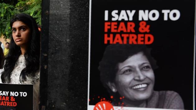 Demonstrators hold placards with the picture of Indian journalist Gauri Lankesh during a 'Not In My Name' protest in New Delhi on September 7. (AFP Photo) Demonstrators hold placards with the picture of Indian journalist Gauri Lankesh during a 'Not In My Name' protest in New Delhi on September 7. (AFP Photo)