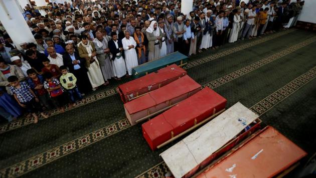 Mourners perform prayers during the funeral of eight family members killed by a Saudi-led air strike in Sanaa, on August 26, 2017. Only one girl, Buthaina Muhammad Mansour, aged between four and five years old, survived the strike. In most of its internal investigations, the coalition either admits making mistakes due to technical errors, bad intelligence or denies responsibility. (Khaled Abdullah / REUTERS) Mourners perform prayers during the funeral of eight family members killed by a Saudi-led air strike in Sanaa, on August 26, 2017. Only one girl, Buthaina Muhammad Mansour, aged between four and five years old, survived the strike. In most of its internal investigations, the coalition either admits making mistakes due to technical errors, bad intelligence or denies responsibility. (Khaled Abdullah / REUTERS)