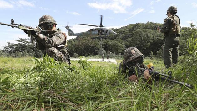 The South Korean defence minister, Song Young-moo, told lawmakers in Seoul a day after the North’s hydrogen bomb test that a Special Forces brigade, described as a ‘decapitation unit’ would be established by the end of the year. ‘The best deterrence we can have, next to having our own nukes, is to make Kim Jong-Un fear for his life,’ said Shin Won-sik, a three-star general who was the South Korean military’s top operational strategist before he retired in 2015. (Hong Gi-won / Yonhap via AP) The South Korean defence minister, Song Young-moo, told lawmakers in Seoul a day after the North’s hydrogen bomb test that a Special Forces brigade, described as a ‘decapitation unit’ would be established by the end of the year. ‘The best deterrence we can have, next to having our own nukes, is to make Kim Jong-Un fear for his life,’ said Shin Won-sik, a three-star general who was the South Korean military’s top operational strategist before he retired in 2015. (Hong Gi-won / Yonhap via AP)