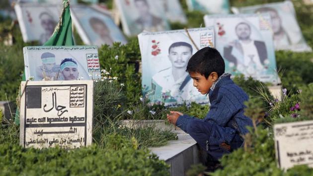 A Yemeni child sits next to the grave of a loved one in a cemetery in the capital Sanaa on September 1, 2017, on the morning of the first day of Eid al-Adha. Airstrikes the past two years have targeted civilian gatherings at weddings, funerals, hospitals, markets and houses. Over 10,000 people have been killed and three million others displaced as the conflict coupled with a naval and air blockade has pushed Yemen to the brink of famine. (Mohammed Huwais / AFP) A Yemeni child sits next to the grave of a loved one in a cemetery in the capital Sanaa on September 1, 2017, on the morning of the first day of Eid al-Adha. Airstrikes the past two years have targeted civilian gatherings at weddings, funerals, hospitals, markets and houses. Over 10,000 people have been killed and three million others displaced as the conflict coupled with a naval and air blockade has pushed Yemen to the brink of famine. (Mohammed Huwais / AFP)