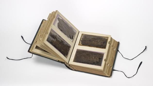 The 70 leaves of birch bark that make up the Bakhshali manuscript are housed in this specially designed book at the Bodleian Libraries’ Weston Library, Oxford.(Image courtesy: Bodleian Libraries, University of Oxford)