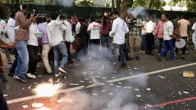 NSUI supporters celebrate outside 10 Janpath after their candidates won two posts DUSU polls. (PTI) NSUI supporters celebrate outside 10 Janpath after their candidates won two posts DUSU polls. (PTI)