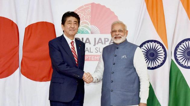 Prime Minister Narendra Modi and his Japanese counterpart Shinzo Abe shake hands at the India-Japan annual summit in Gandhinagar, Gujarat, on September 14, 2017.(PTI)