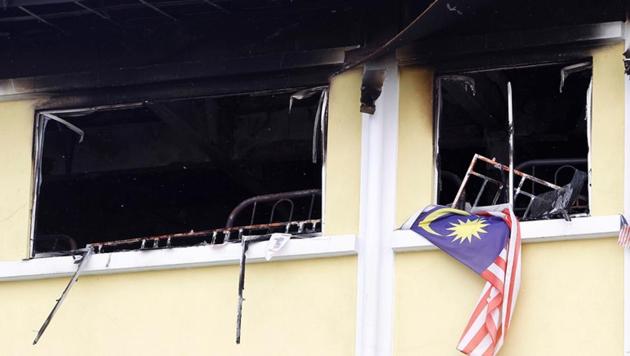 The blaze broke out before dawn in the two-storeyed building, Tahfiz Darul Quran Ittifaqiyah, located in the centre of the capital Kuala Lumpur. (Lai Seng Sin / REUTERS) The blaze broke out before dawn in the two-storeyed building, Tahfiz Darul Quran Ittifaqiyah, located in the centre of the capital Kuala Lumpur. (Lai Seng Sin / REUTERS)