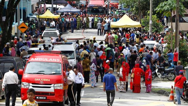 Firefighters rushed to the scene and the blaze was doused out within an hour, but not before it caused massive devastation. (Lai Seng Sin / REUTERS) Firefighters rushed to the scene and the blaze was doused out within an hour, but not before it caused massive devastation. (Lai Seng Sin / REUTERS)