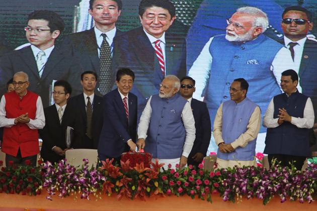 Today morning, Prime Minister Narendra Modi and his Japanese counterpart Shinzo Abe laid the foundation stone of the 508-km long Mumbai-Ahmedabad High Speed Rail at the Sabarmati athletic ground in Ahmedabad . They are expected to sign several agreements on strategic, financial and development cooperation. (Ajit Solanki / AP) Today morning, Prime Minister Narendra Modi and his Japanese counterpart Shinzo Abe laid the foundation stone of the 508-km long Mumbai-Ahmedabad High Speed Rail at the Sabarmati athletic ground in Ahmedabad . They are expected to sign several agreements on strategic, financial and development cooperation. (Ajit Solanki / AP)