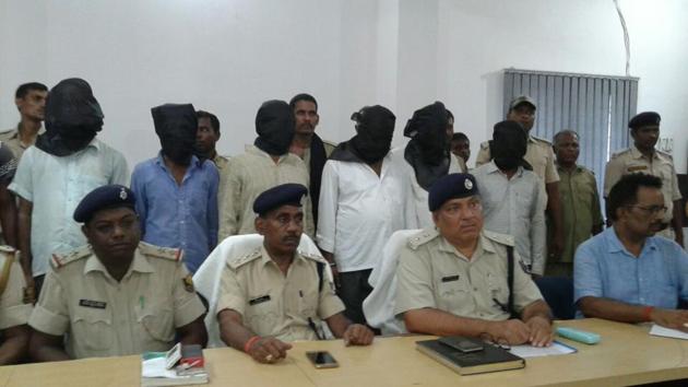 The arrested teachers and panchayat secretaries at a police station in Bihar’s Arwal district. (HT photo) The arrested teachers and panchayat secretaries at a police station in Bihar’s Arwal district. (HT photo)