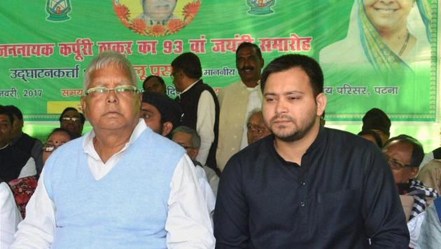 RJD chief Lalu Prasad Yadav with his son Tejashwi Yadav. (PTI File Photo)