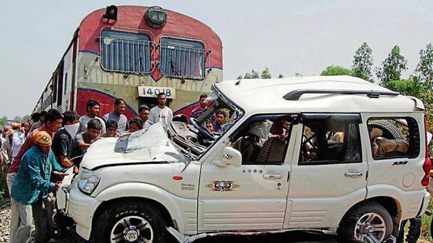 Villagers trying to clear the track after an SUV collided with a train at Parjian village of Sultanpur in April 2011. The division has reported four deaths due to unmanned crossings in the past two years. (HT File) Villagers trying to clear the track after an SUV collided with a train at Parjian village of Sultanpur in April 2011. The division has reported four deaths due to unmanned crossings in the past two years. (HT File)
