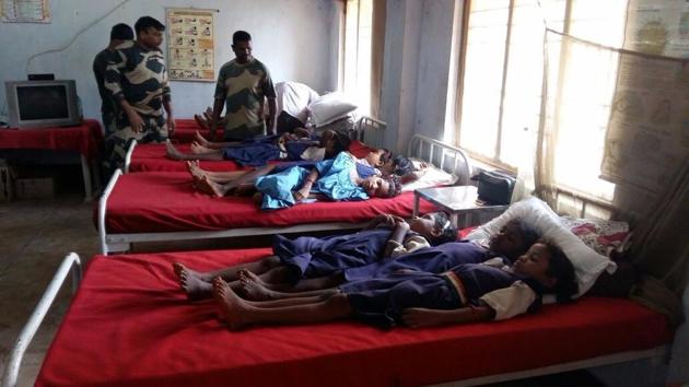 School girls at the BSF’s temporary hospital in Badapada on Friday where they were treated for food poisoning.(HT PHOTO)