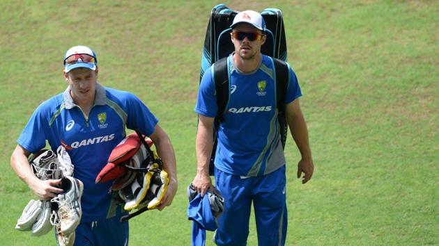 James Faulkner (L) and Travis Head (R) arrive a training session. Both these all-rounders will have a big role to play in the series. (AFP) James Faulkner (L) and Travis Head (R) arrive a training session. Both these all-rounders will have a big role to play in the series. (AFP)