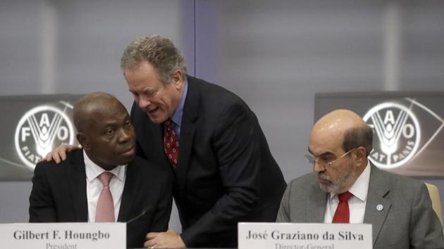 United Nations World Food Programme executive-director David Beasly, centre, shares a word with IFAD President Gilbert F. Houngbo, left, and director-general of the United Nations Food and Agriculture Organization (FAO) Jose' Graziano da Silva, at the FAO headquarters, in Rome on September 15, 2017. (AP) United Nations World Food Programme executive-director David Beasly, centre, shares a word with IFAD President Gilbert F. Houngbo, left, and director-general of the United Nations Food and Agriculture Organization (FAO) Jose' Graziano da Silva, at the FAO headquarters, in Rome on September 15, 2017. (AP)