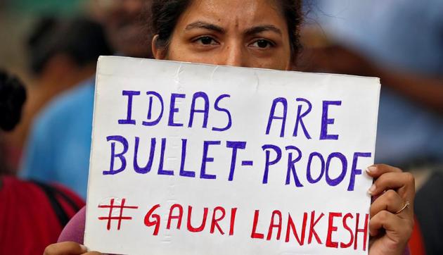 People attend a protest in New Delhi against the killing of Gauri Lankesh, a senior Indian journalist who, according to police, was shot dead outside her home on Tuesday by unidentified assailants in the southern city of Bengaluru, India, September 7, 2017. REUTERS/Cathal McNaughton(REUTERS)