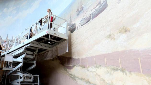 Art restorers on a raised platform during restoration work on the Panorama Mesdag. (AFP) Art restorers on a raised platform during restoration work on the Panorama Mesdag. (AFP)