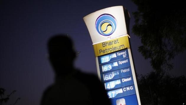 A Bharat Petroleum oil pump station displays the price of unleaded petrol and diesel as a pedestrian walks past in New Delhi. (Reuters) A Bharat Petroleum oil pump station displays the price of unleaded petrol and diesel as a pedestrian walks past in New Delhi. (Reuters)