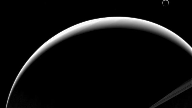 Titan’s crescent nearly encircles its disk due to the small haze particles high in its atmosphere scattering the incoming light of the distant Sun. By the end of the Cassini mission, the spacecraft will have observed almost half of a Saturn year, which is 29 Earth years long. (NASA/JPL-Caltech/Space Science Institute/AP) 