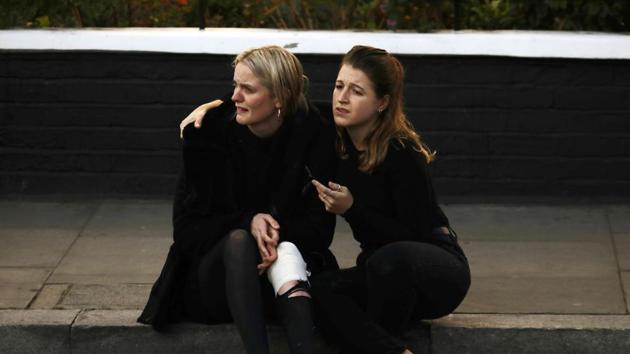 An injured woman reacts outside Parsons Green tube station in London, Britain September 15, 2017. (Kevin Coombs / REUTERS)