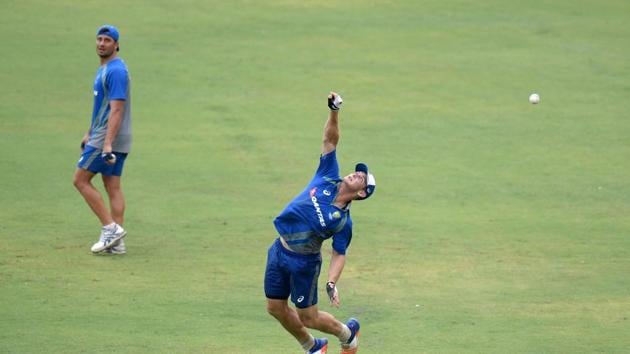 Australian cricketer Hilton Cartwright (R) dives to take a catch during a training session ahead of the India-Australia cricket series (AFP) Australian cricketer Hilton Cartwright (R) dives to take a catch during a training session ahead of the India-Australia cricket series (AFP)