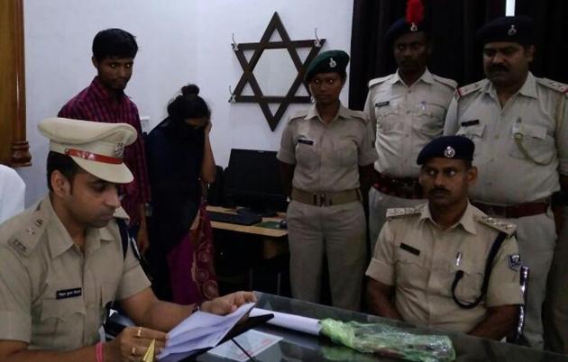 Purnia superintendent of police (SP) Nishant Tiwary (left) with the arrested woman and her paramour. (HT photo) Purnia superintendent of police (SP) Nishant Tiwary (left) with the arrested woman and her paramour. (HT photo)