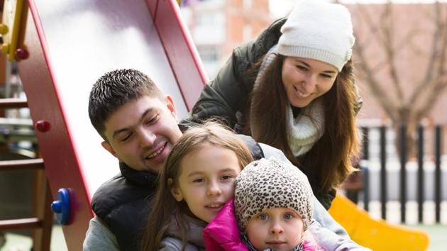 Many parents and caregivers go down a slide with a young child on their lap without giving it a second thought. (Shutterstock) Many parents and caregivers go down a slide with a young child on their lap without giving it a second thought. (Shutterstock)