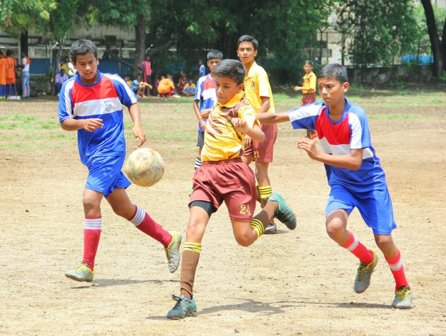 St Vincent’s School (yellow) thrashed Angel Mickey and Minnie School 7-0 to enter the quarterfinals of the boys’ under-14 inter-school football tournament. (HT Photo) St Vincent’s School (yellow) thrashed Angel Mickey and Minnie School 7-0 to enter the quarterfinals of the boys’ under-14 inter-school football tournament. (HT Photo)