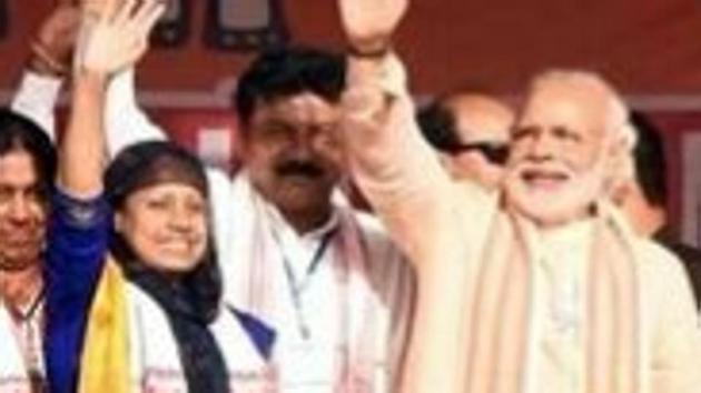 Benazir Arfan (in indigo sari) with Prime Minister Narendra Modi at a rally in Assam last year.(HT File Photo) Benazir Arfan (in indigo sari) with Prime Minister Narendra Modi at a rally in Assam last year.(HT File Photo)