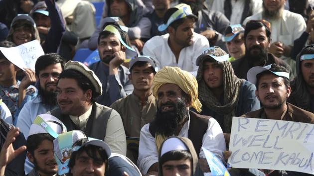 In this Tuesday, Sept. 12, 2017, photo, cricket fans celebrate during Speenghar Tigers' versus Boost Defenders in Kabul, Afghanistan. (AP) In this Tuesday, Sept. 12, 2017, photo, cricket fans celebrate during Speenghar Tigers' versus Boost Defenders in Kabul, Afghanistan. (AP)
