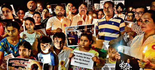 School children and their parents in Chandigarh participate in a candle march to highlight safety issues after the tragic death of a student in Gurgaon. (Ravi Kumar/Hindustan Times/For representation only) School children and their parents in Chandigarh participate in a candle march to highlight safety issues after the tragic death of a student in Gurgaon. (Ravi Kumar/Hindustan Times/For representation only)