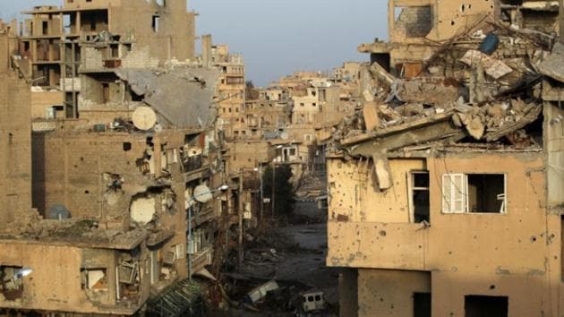 A view shows damaged buildings in Deir al-Zor, eastern Syria February 19, 2014. (Reuters File) A view shows damaged buildings in Deir al-Zor, eastern Syria February 19, 2014. (Reuters File)