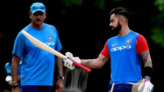 Indian cricket team captain Virat Kohli and head coach Ravi Shastri during a practice session at MAC Stadium on the eve of the first ODI match against Australia, in Chennai on Saturday. (PTI) Indian cricket team captain Virat Kohli and head coach Ravi Shastri during a practice session at MAC Stadium on the eve of the first ODI match against Australia, in Chennai on Saturday. (PTI)