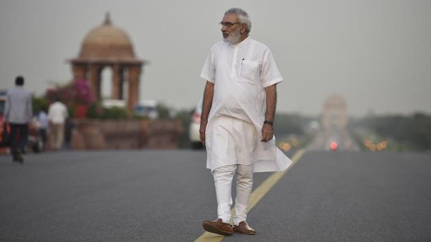 Bhatia, 62, says it has been over 20 years since he has been dressing like this. It was in 2013, before Modi’s candidature announcement that he stopped dying his hair to make his wife (who was ill and had a reaction to chemical dyes causing her hair to go completely white) feel better and support of her. (Raj K Raj/HT Photo) Bhatia, 62, says it has been over 20 years since he has been dressing like this. It was in 2013, before Modi’s candidature announcement that he stopped dying his hair to make his wife (who was ill and had a reaction to chemical dyes causing her hair to go completely white) feel better and support of her. (Raj K Raj/HT Photo)