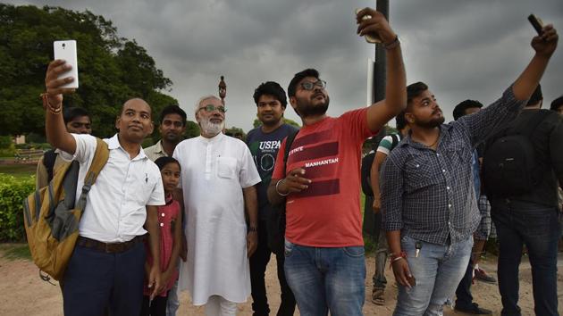 During roadshows and rallies most people simply assume that he is Modi, Jagdish says. He was once stopped by people in Select Citywalk, Saket, who were concerned that he was roaming about without any security. Another instance happened when he was stuck in the Delhi metro and people refused to accept his true identity to which he had to pull out media coverage of himself and respond with the truth. (Raj K Raj/HT Photo) During roadshows and rallies most people simply assume that he is Modi, Jagdish says. He was once stopped by people in Select Citywalk, Saket, who were concerned that he was roaming about without any security. Another instance happened when he was stuck in the Delhi metro and people refused to accept his true identity to which he had to pull out media coverage of himself and respond with the truth. (Raj K Raj/HT Photo)