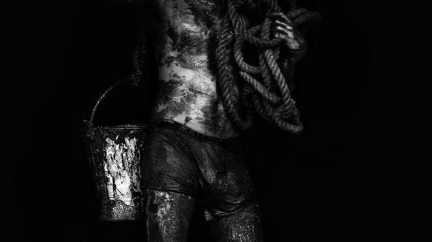 ‘I have been doing this work for 11 years now, but I am still scared every time I go down. You never know what you will find inside the sewer and what state you will come out in’, says 25-year-old Vikas. ‘My back is covered with rashes and black patches from working in sewers for 14 years. But on an earning of ₹7,000 a month, I can’t afford to go to a doctor for skin ailments’, says 40-year-old Rajesh Kumar. (Ravi Choudhary / HT Photo)