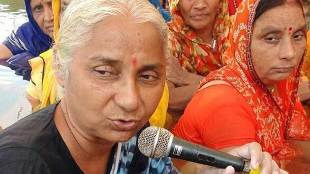 Social activist Medha Patkar and other villagers protest the construction of Sardar Sarovar Dam at Chhota Barda Village in Badwani district of Madhya Pradesh on Saturday.(PTI Photo) Social activist Medha Patkar and other villagers protest the construction of Sardar Sarovar Dam at Chhota Barda Village in Badwani district of Madhya Pradesh on Saturday.(PTI Photo)