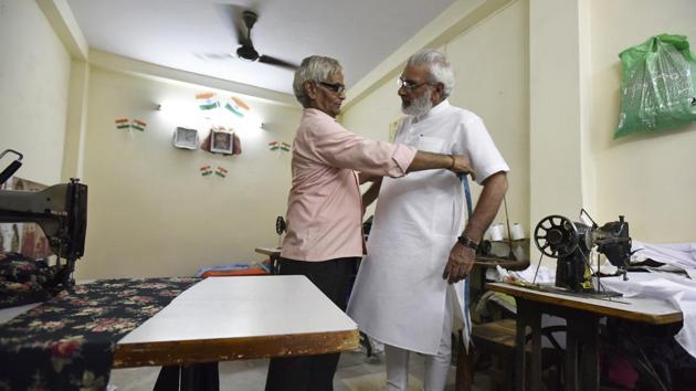 The only change he has brought to his attire, Jagdish says is the half-sleeved kurta. In all other ways, he has simply been following his own sartorial preferences. He notes that the V-cut jacket that Modi wears is something that Jagdish has been wearing for over 20 years, albeit in wool. The resemblance to Modi is a coincidence but not very far from what Jagdish Bhatia is himself. (Raj K Raj/HT Photo) The only change he has brought to his attire, Jagdish says is the half-sleeved kurta. In all other ways, he has simply been following his own sartorial preferences. He notes that the V-cut jacket that Modi wears is something that Jagdish has been wearing for over 20 years, albeit in wool. The resemblance to Modi is a coincidence but not very far from what Jagdish Bhatia is himself. (Raj K Raj/HT Photo)