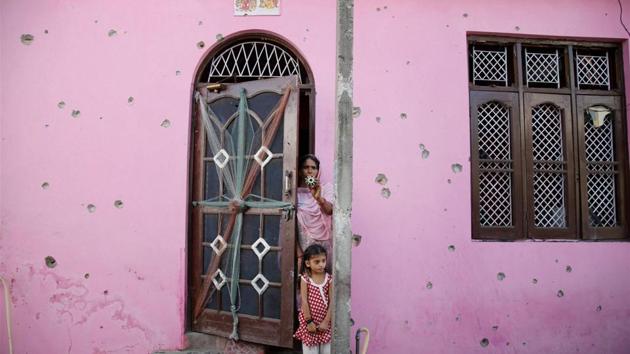 Bullet marks on the wall of a house after firing by Pakistan forces in Jammu and Kashmir’s Arnia sector. (PTI Photo) Bullet marks on the wall of a house after firing by Pakistan forces in Jammu and Kashmir’s Arnia sector. (PTI Photo)